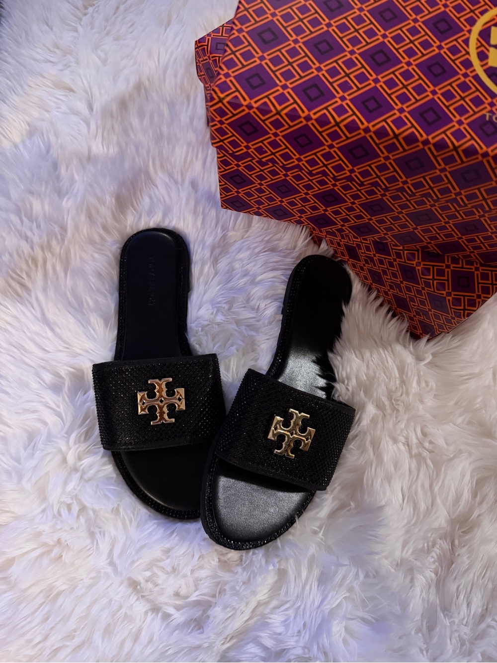 Black Slip-On Women's Sandals with Gold Emblem